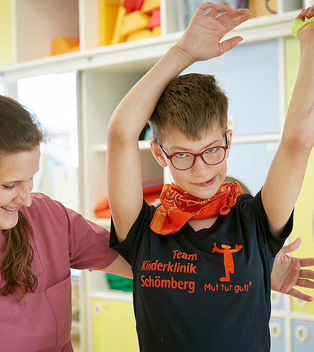 Picture: Physiotherapist assesses the motor impairment of an older child