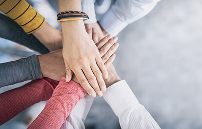 Donations for the Schömberg Children's Hospital Picture: Many hands interlock. Together we are stronger
