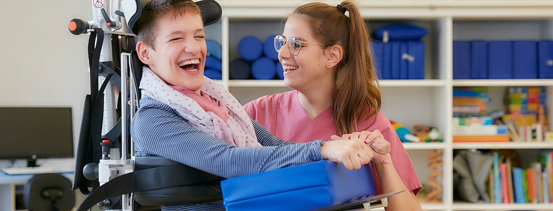 Picture: Physiotherapist communicating with an adolescent patient during the therapy session.