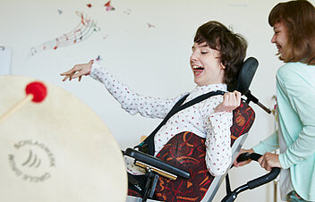 Picture: Two patients moving in rhythm to the music