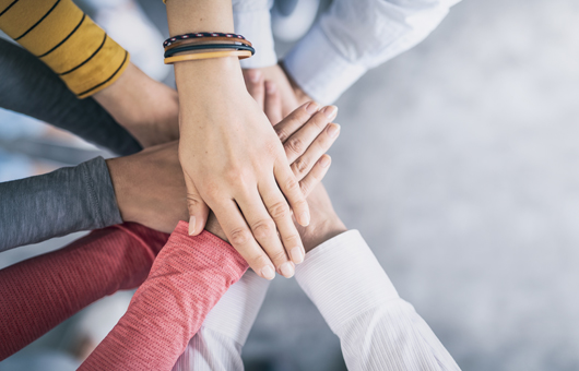 Donations for the Schömberg Children's Hospital Picture: Many hands interlock. Together we are stronger